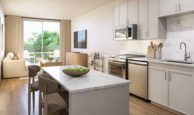 a kitchen with white cabinets